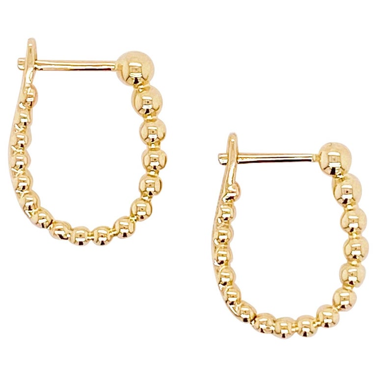 Gold Beaded Oval Huggie Earrings - Main Image