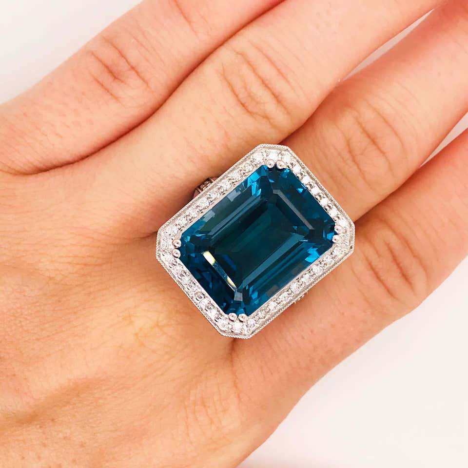 27 Carat Topaz and Diamond Halo Ring Five Star Jewelry Brokers